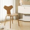17a4b71fa5a46b06bb2ae5643a99867b.jpg Contemporary Wing-Shaped Chair - Sleek Minimalist Seating Solution
