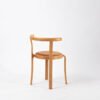 Modern Wooden Armchair with Curved Backrest - Round Padded Seat & Tapered Legs for Living Room