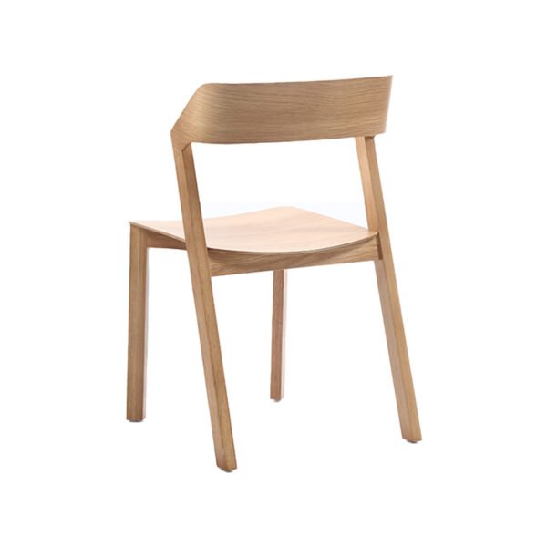242f1c2d4c0c583f574f099ea0b2059e.jpg Modern Curved Back Chair - Ergonomic Design with Smooth Lines, Minimalist Seating for Home/Office