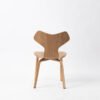 58b272a97b2c0a3ed0f60c7194c1a9c0.jpg Contemporary Wing-Shaped Chair - Sleek Minimalist Seating Solution
