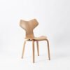 5d385ca2c2592d0b5c2112c0319b9b53.jpg Contemporary Wing-Shaped Chair - Sleek Minimalist Seating Solution