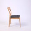 878c0ea4d66ad77fe67a72f640abc372.jpg Modern Solid Light Wood Dining Chair with Curved Backrest for Home Office Cafe Use-Versatile Home Furniture for Hotels Schools