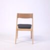 fa51214acd0cde0502199de06b2f4b96.jpg Modern Solid Light Wood Dining Chair with Curved Backrest for Home Office Cafe Use-Versatile Home Furniture for Hotels Schools