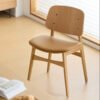 Modern Curved Back Chair - Ergonomic Design with Smooth Lines, Minimalist Seating for Home/Office